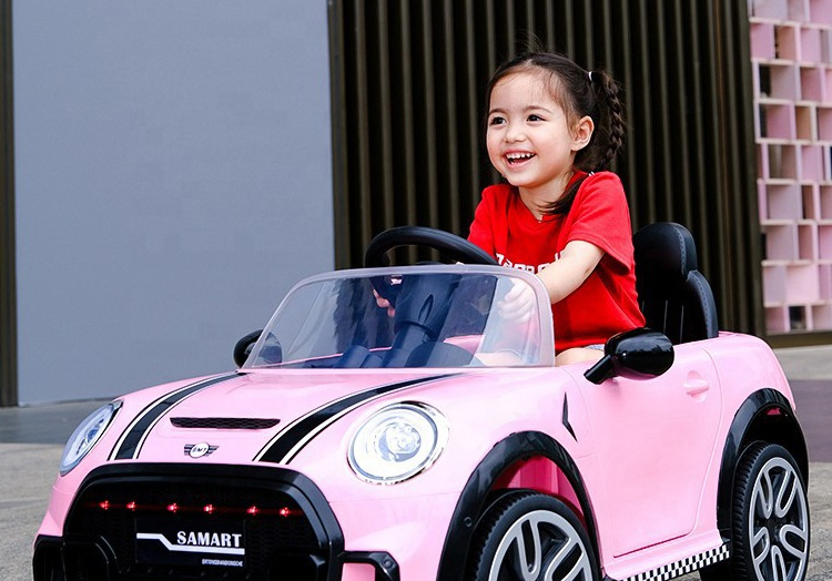 childs pink electric car
