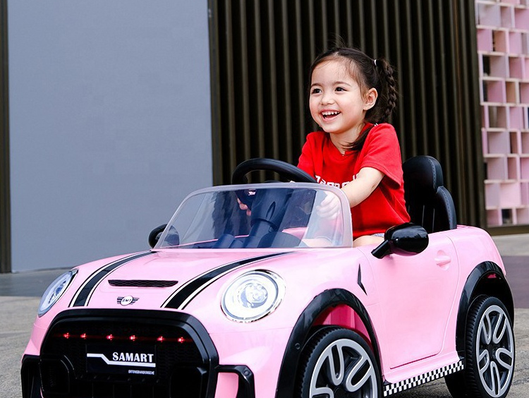 childs pink electric car