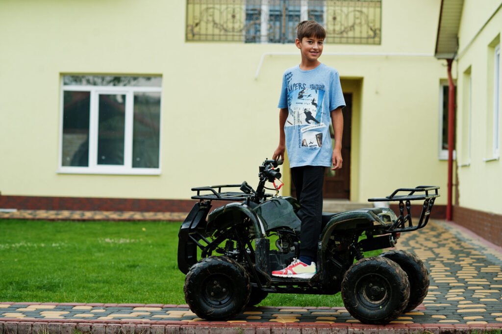 garcon-en-quad-atv-fourwheller-1-1024x681 Your Guide to 24v Electric Cars