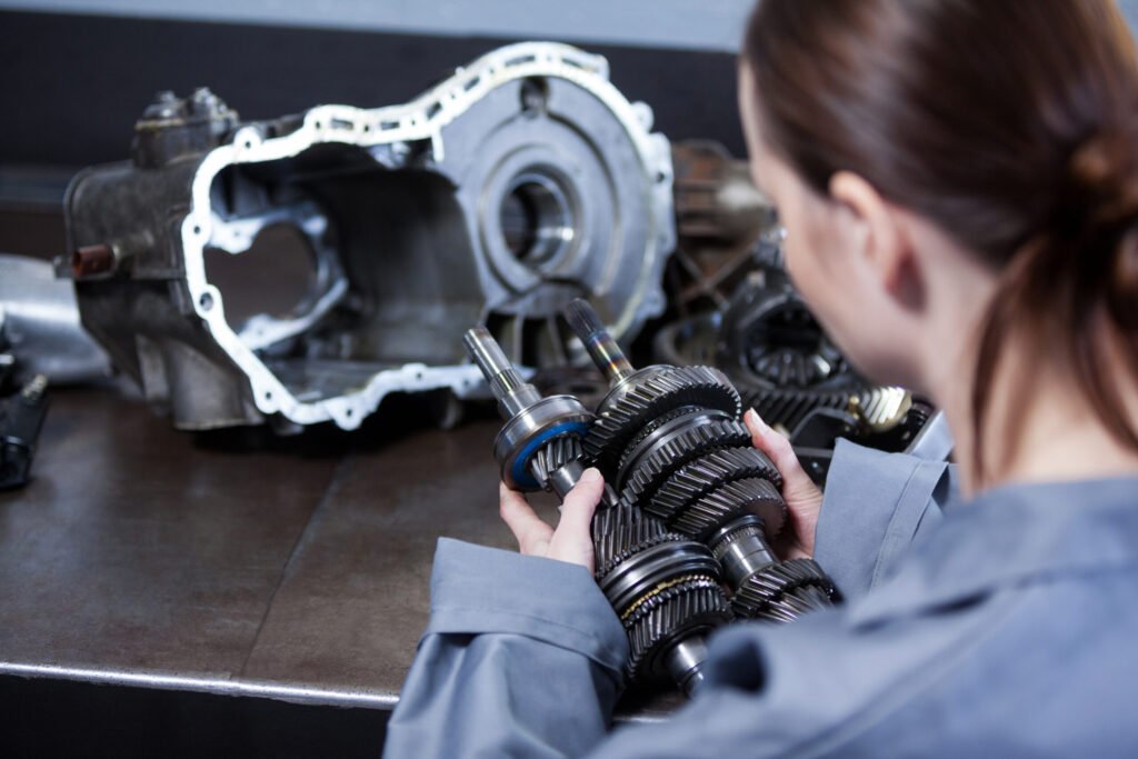 mecanicien-femme-tenant-des-pieces-de-rechange-1024x683 How to Convert Car to Electric Kit: A Step-by-Step Guide