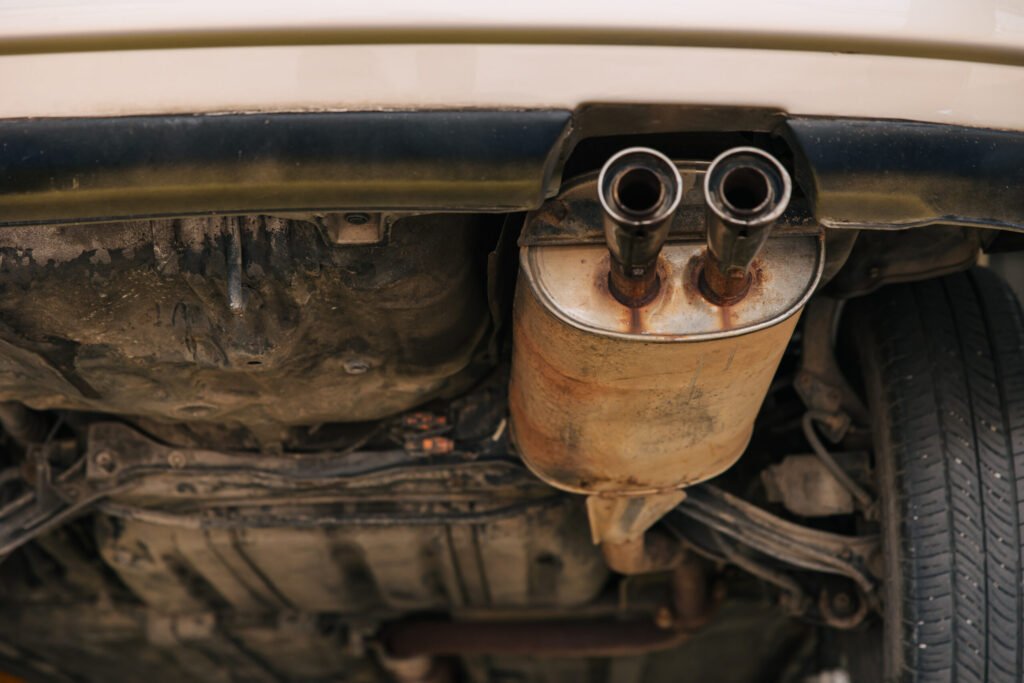 vecteezy_under-car-exhaust-pipe-muffler-old-aged-rust-rusty-closeup_52618841-1024x683 Do Electric Cars Have Catalytic Converters?
